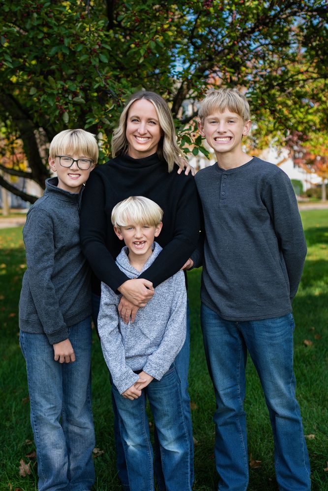 Mother with her three sons in a park